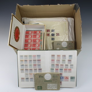 A box of mint and used German stamps 1872-1945 including 4 stock books loose leaf