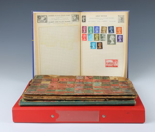 A loose leaf album of mint and used world stamps George VI and later a New Victory album of mint and used world stamps and an Improved Postage stamp album, together with with loose leaf stamps