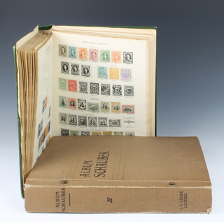 A New Ideal postage stamp album of world stamps - NIgeria, Austria, Belgian, Brazil, Chile, China, France, Germany, Holland and Schaubek of world stamps 
