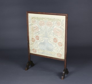 A beech framed fire screen in the manner of Morris and Co containing a silk work embroidery  82cm h x 15cm x 23cm 
