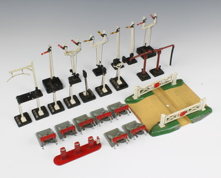 A Hornby Dublo level crossing, 4 Hornby Dublo signals together with 9 various electrically operated signals, a water crane and 7 Hornby Meccano buffer stops 