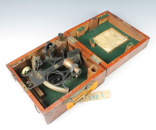 A Henry Hughes sextant with certificate dated 17/2/42 contained in mahogany case 