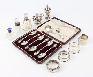 A set of 6 fancy silver teaspoons with pierced handles Sheffield 1925, cased, minor silver mounted bottles and condiments, 280 grams 