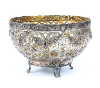 A Continental 800 pierced bowl decorated with flowers and birds on scroll feet 351 grams, 17.5cm 