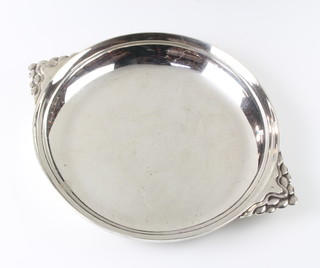 A silver shallow dish with twin handles, Sheffield 1945, maker James Dixon 5cm 259 grams 