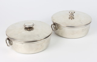 A pair of Austrian silver 800 standard circular tureens and covers with drop ring handles, 2077 grams 21cm 