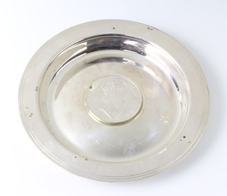 A silver Armada dish with coin set, London 1977, 130 grams 13cm 