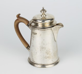 A Queen Anne style silver cream jug in the form of a coffee pot with fruit wood handle, London 1911, maker Stewart Dawson 14cm, 266 grams gross