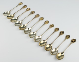 A set of 12 silver teaspoons with ornithological handles London 1975, 320 grams  
