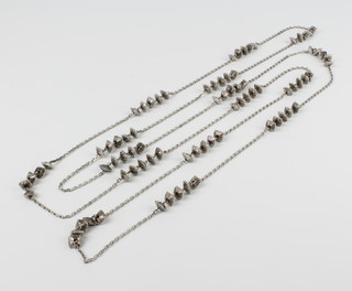 A silver fancy link guard chain 190cm, 61 grams