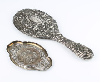 An Edwardian repousse silver Reynolds angels quatrefoil pin dish London 1904 together with a silver backed hand mirror