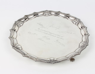 A silver salver with fancy rim and chased inscription Birmingham 1937, maker Barker Bros 570 grams, 26cm 