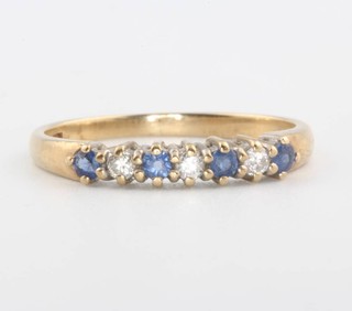 A 9ct yellow gold gem set ring size M 1/2