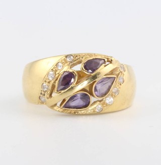 A yellow gold amethyst and gem set ring size O 