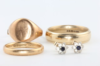 A 9ct yellow gold wedding band size L 1/2, a do. size U, a cut signet ring and a pair of ear studs 11 grams 