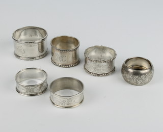 A silver napkin ring Birmingham 1927 and 4 others 104 grams