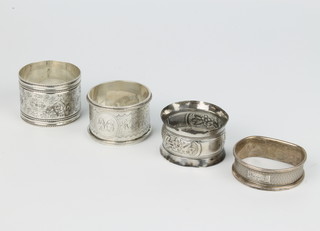 An Edwardian silver napkin ring Birmingham 1907 and 4 others, 92 grams