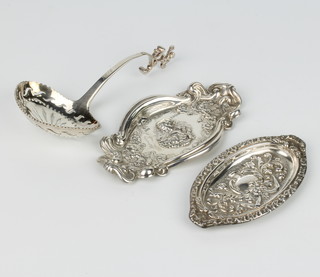 A Victorian style silver pin dish London 1990, 1 other and a Continental sifter spoon, 80 grams 
