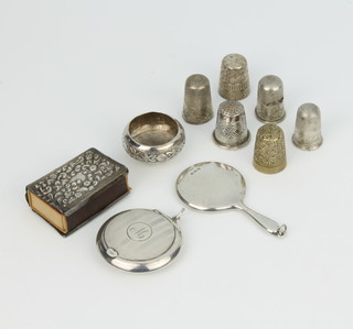 A miniature silver dressing table mirror Birmingham 1942, a compact, 6 thimbles, a dish and a vesta case 