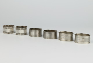 A pair of Victorian silver napkin rings, Birmingham 1896, 2 other pairs 128 grams 