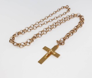 A 9ct yellow gold crucifix pendant and chain 11.6 grams