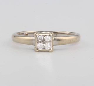 An 18ct white gold 4 stone diamond ring size M 