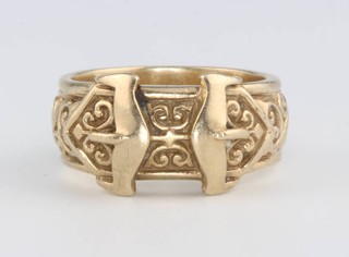 A 9ct yellow gold cast buckle ring size W 16.1 grams 