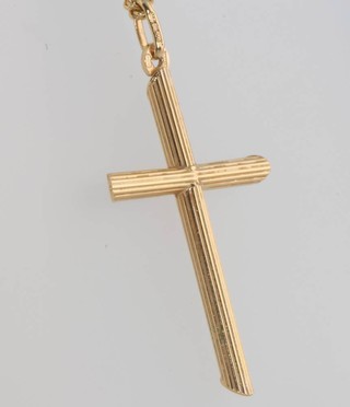A 9ct yellow gold cross pendant on chain 6.7 grams