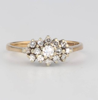A 9ct yellow gold diamond ring size K 