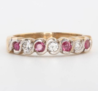 A 9ct yellow gold ruby and diamond ring size N 