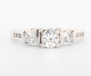 A 14ct white gold 3 stone diamond ring approx. 1.10ct size P 1/2
