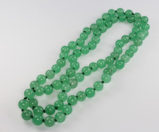 A string of jadeite beads 66cm 