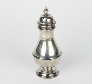 A silver sugar shaker of Queen Anne design London 1910 143 grams