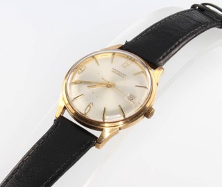 A gentleman's 9ct yellow gold Garrard wristwatch with calendar dial no.6912 