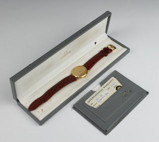 A gentleman's 18ct yellow gold Omega Deville calendar wristwatch on a do. leather bracelet, boxed and with original certificate 