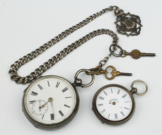 A silver keywind pocket watch with seconds at 6 o'clock and a do. Albert with fob together with a silver fob watch 