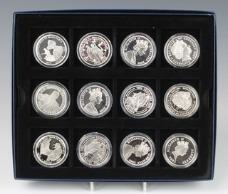 Twelve silver commemorative crowns 336 grams 