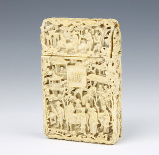 A carved ivory Cantonese card case depicting figures at pursuits before pavilions with a European monogram 11.5cm x 7.5cm x 2.5cm 