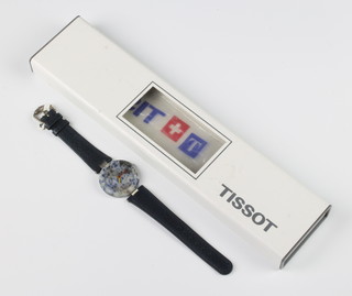 A gentlemans Tissot rock watch on blue leather strap boxed