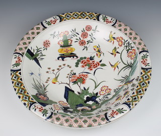 A modern Delft wall plaque decorated with exotic birds, insects and Chinese motifs 45cm 
