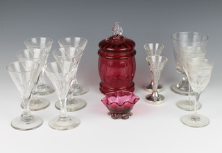 A cranberry lidded jar and cover 17cm, a do. dish 6cm, a matched set of 6 cordials and 5 other glasses