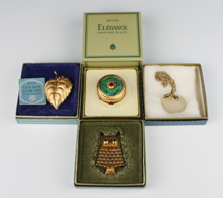 Two Avon solid perfume pin brooches in the form of a leaf and an owl, do. box and a pendant