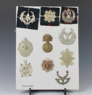 A quantity of re strike  and other  Scottish cap badges 