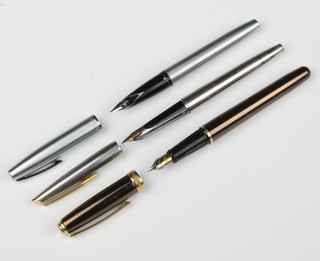 A gentleman's Sheaffer fountain pen with lacquered barrel, a steel cased ditto and a Waterman steel cased fountain pen 