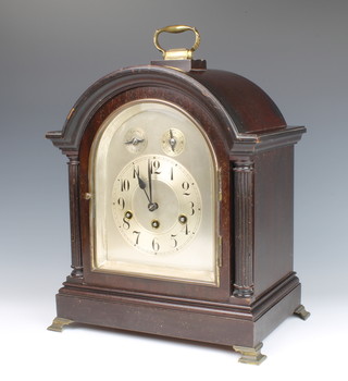 J Unghans of Wurttemberg, an Edwardian 8 day  bracket clock with 16cm arched silvered dial, strike/chime indicator, striking on a gong, contained in a Georgian style arched case, raised on metal ogee bracket feet, the back plate marked J Unghans Wurttemberg B21, 36cm h x 31cm w x 21cm d 