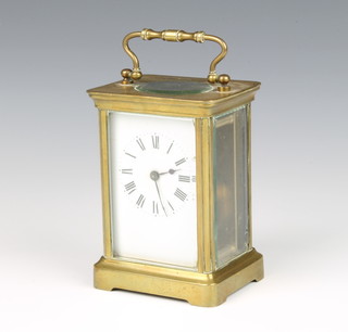 A French 19th Century 8 day carriage timepiece with enamelled dial contained in a gilt metal case 12cm x 8cm x 6cm 