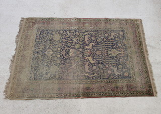 A silk Turkish hunting rug circa 1910, blue ground and decorated stags 202cm x 145cm (some wear)