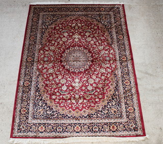 A red ground Belgian cotton Kashan style rug 283cm x 201cm 