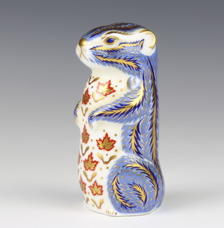 A Royal Crown Derby Imari pattern paperweight in the form of a seated squirrel with gold stopper 10cm  