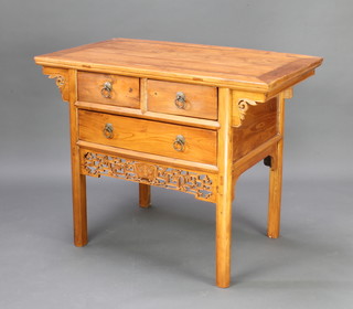 A Chinese hardwood chest of 2 short and 1 long drawer with carved and pierced apron 88cm h x 110cm w x 62cm d 